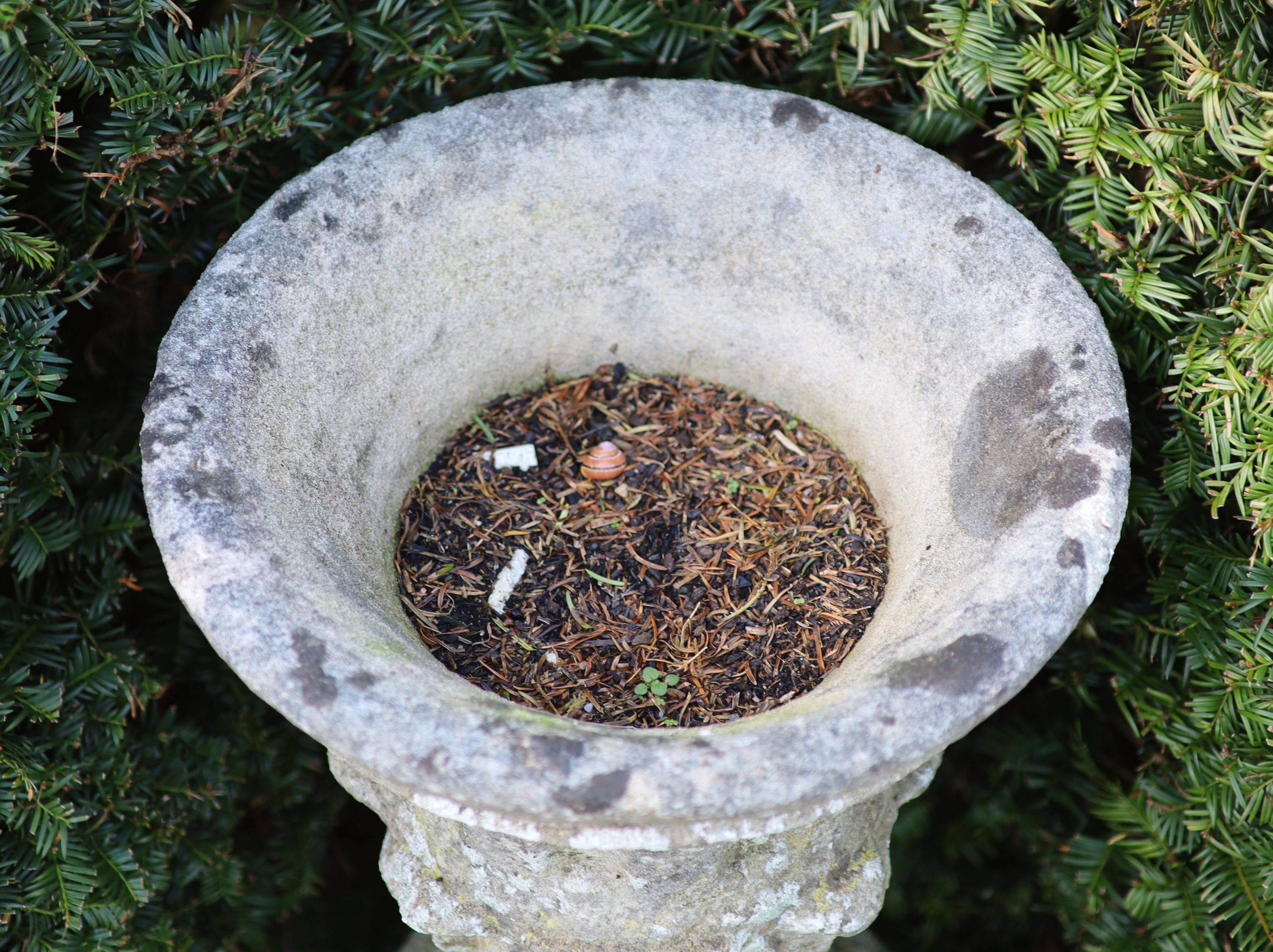 A reconstituted stone garden urn on fluted pedestal, height 112cm diameter 40cm